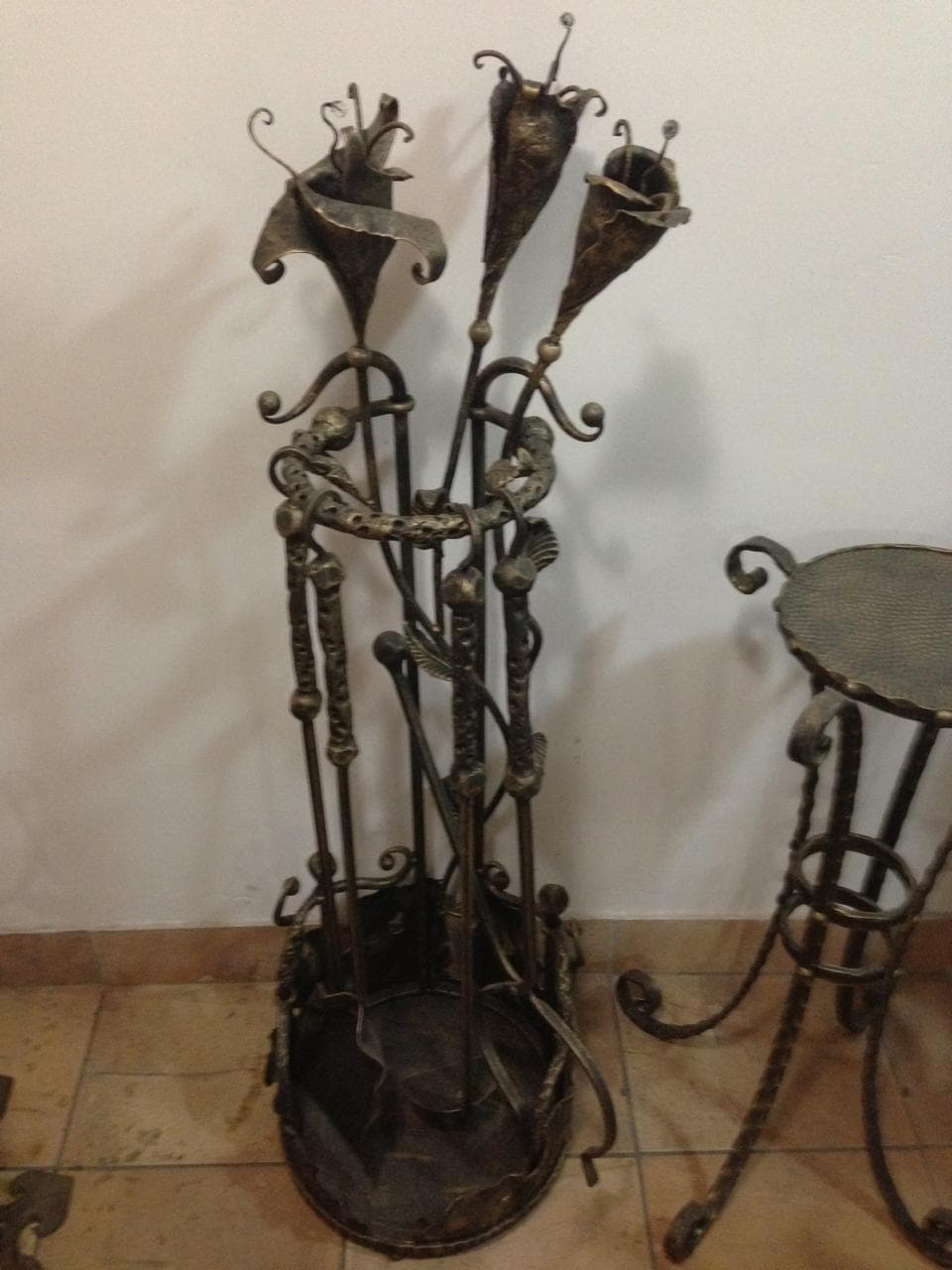Custom fireplace surround, screen, and forged accessory work, selected view 2