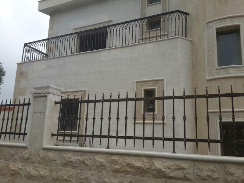 Exterior metal window guard, fence, and railing work, selected view 2