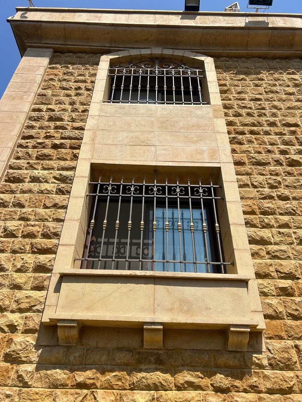 Exterior metal window guard, fence, and railing work, selected view 10